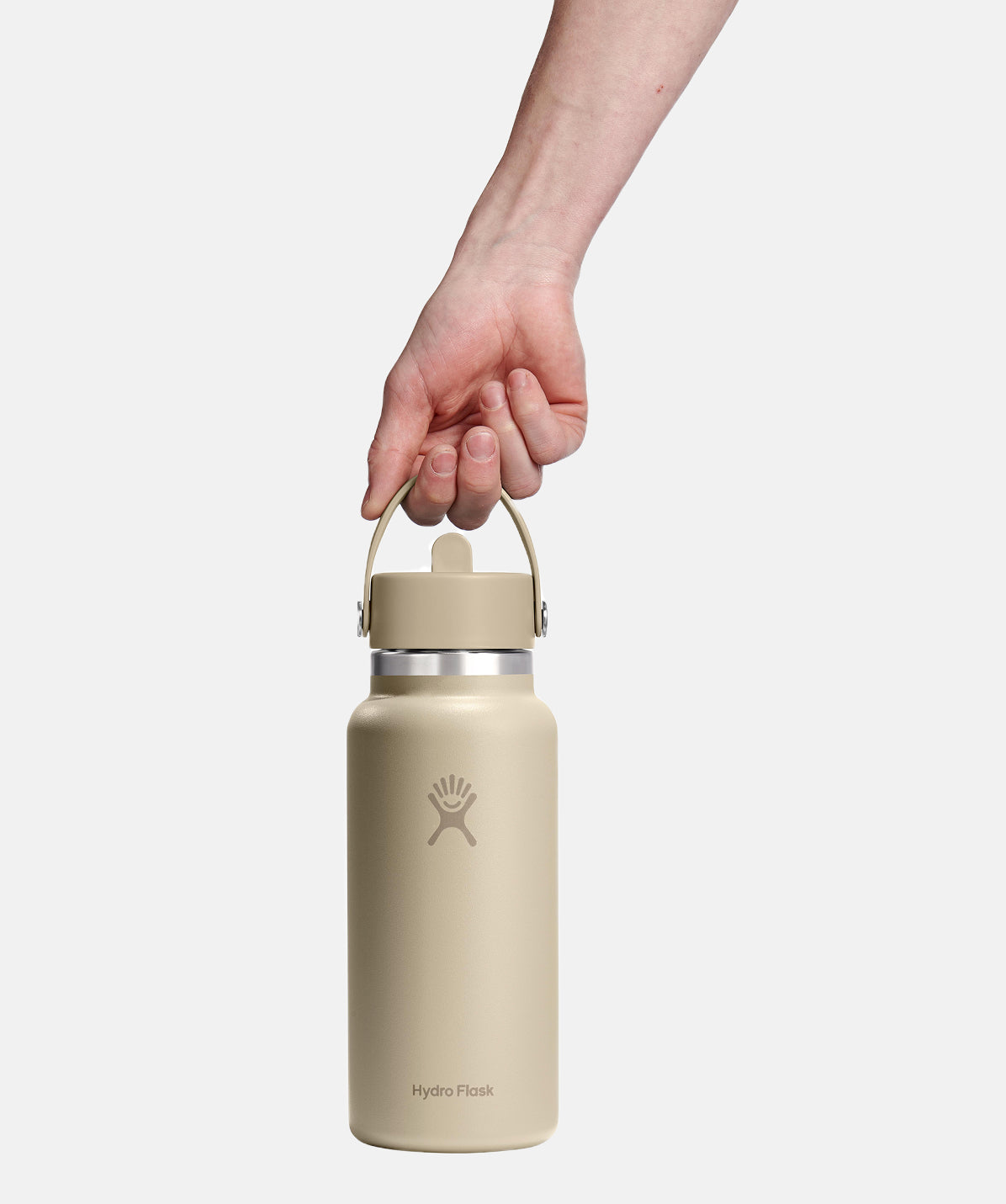 Botella Hydro Flask Wide Flex Straw Cap Oat 32oz, boca ancha. Detalle del agarre de la tapa con pajita.