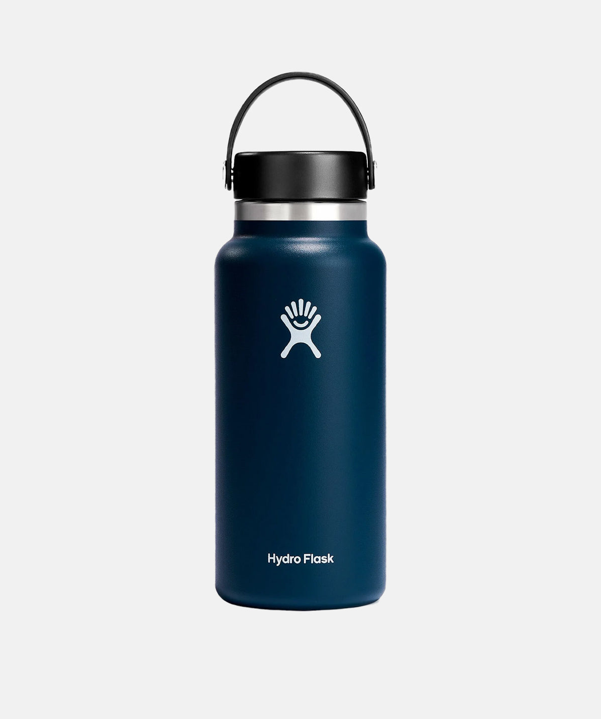 Botella Hydro Flask Wide Mouth 32oz color Índigo, sujetada con la mano, mostrando el agarre y la tapa Flex Cap.