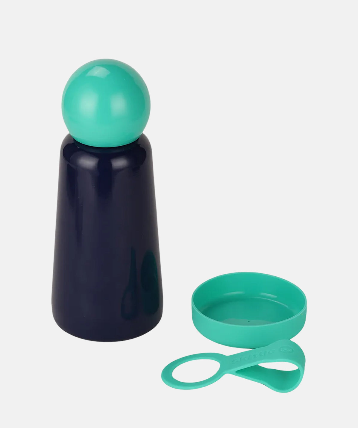 Botella Lund Mini Skittle Lite 300ml turquesa (verde) e índigo (azul). Ideal para llevar en el bolsillo o bolso pequeño.