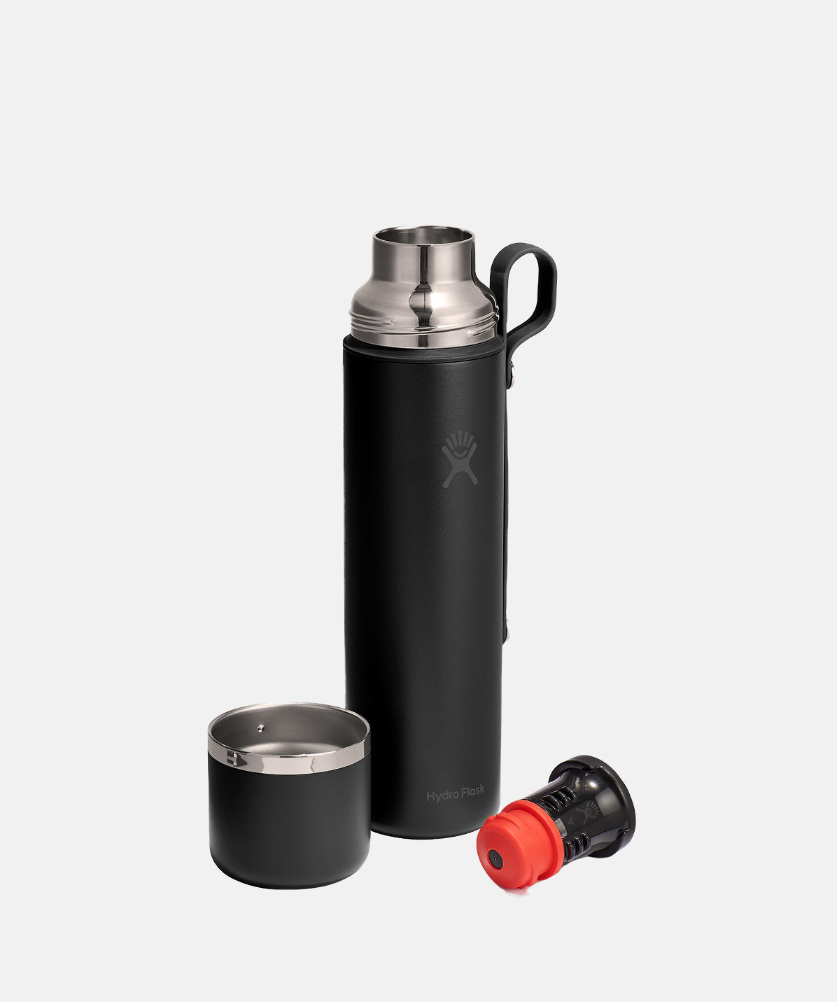 Termo Hydro Flask 36oz Negro, detalle del tapón vertedor y sistema de sellado interno, abierto.