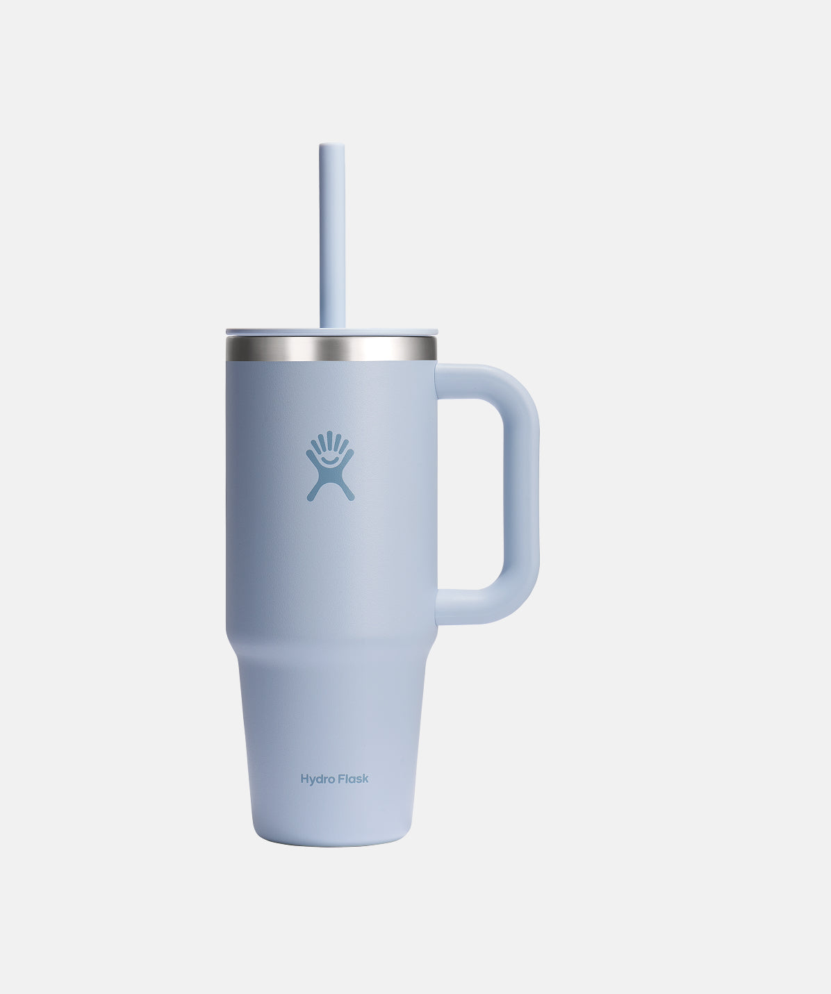 Vaso Hydro Flask Travel Tumbler 710ml Surf, acero inoxidable en color morado claro, con asa.