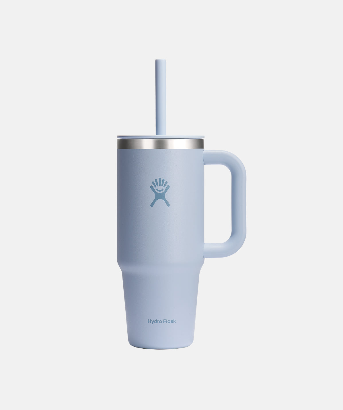 Vaso Hydro Flask Travel Tumbler 710ml Surf, acero inoxidable en color morado claro, con asa.