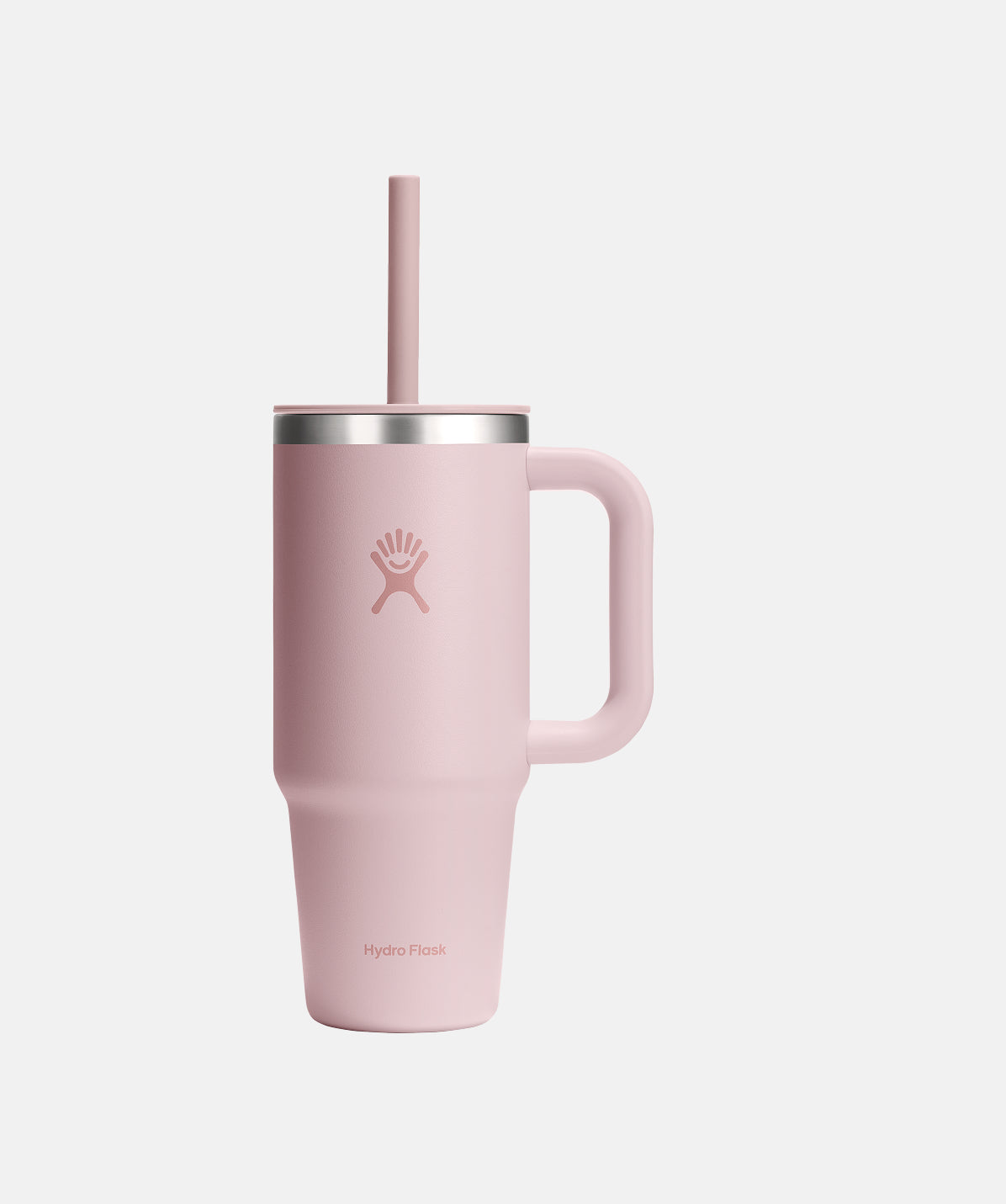Vaso Hydro Flask Travel Tumbler 710ml Trillium, acero inoxidable en color rosa, con asa y pajita.